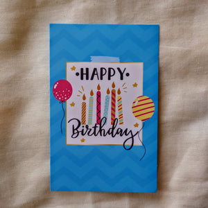 Happy birthday kaart - blauw met kaarsjes en ballonnen - Insight Stones